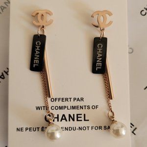 Nw CHANEL rose gold black stainless steel earrings